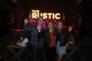 People posing for photo at The Rustic